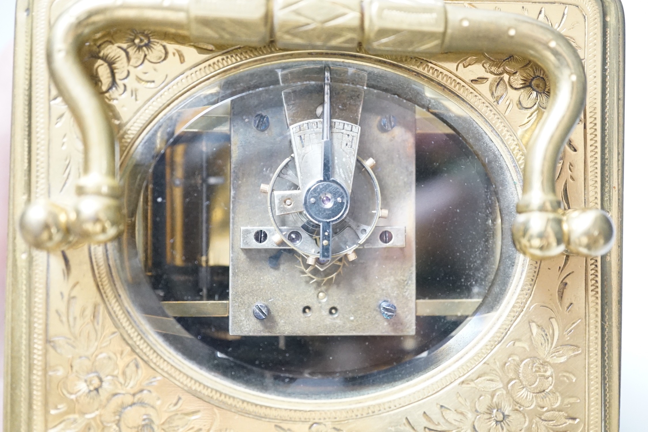 A 19th century engraved brass carriage clock by A Margaine, 14cm